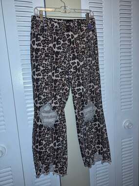 Sterling Kreek Hear Me Roar Distressed Leopard Print Jeans